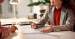 © peopleimages.com - Contract, woman and hands of advisor for interview, information or document for job application. Advice, client or human resource agent with paperwork for registration, opportunity or deal agreement