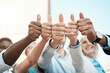© peopleimages.com - Group of people, thumbs up and solidarity in vote for job opportunity, collaboration or community. Team, business and together for feedback, networking or human resources agency with success as staff