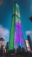 Modern Skyscraper with Colorful Lights at Night