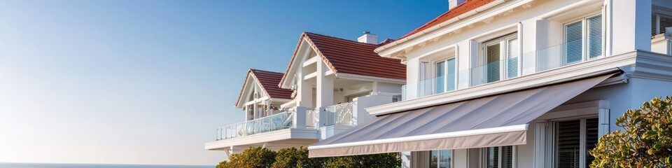 Wall Mural - Sunny day photography of a luxury beach home with a ruby roof.