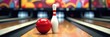 © val - A vibrant bowling alley scene featuring a red bowling ball and a single pin, perfect for sports promotions, entertainment, and recreational activities.