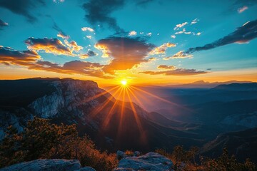 Wall Mural - Stunning sunset over mountain range. Perfect for nature, travel, and adventure themes.