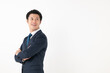 © Peak River - 腕組みするビジネスマン