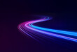 © joeycheung - Abstract streaks of light in shades of blue and purple curve against a dark background.