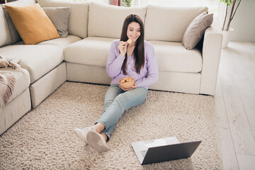 Wall Mural - Full body photo of nice young teen girl watch movie netbook relax wear violet clothes enjoy modern cozy bright interior flat indoors