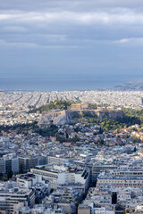 Aerial view of the city with hill of Acropolis of Athens from the Mount Lycabettus, Athens, Greece