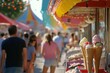 © Nico - A busy street fair with an ice cream stand selling cones, cups, and sundaes.