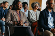 © Jacob Lund - Diverse business audience attending a conference presentation, colleagues sitting and taking notes