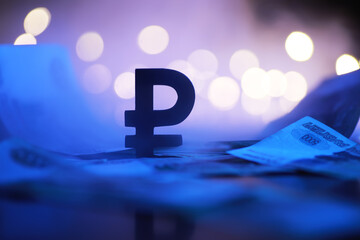 Wall Mural - Russian Ruble Symbol with Blue Lighting and Blurred Bokeh Background