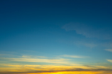 Wall Mural - blue sky with colorful cirrus clouds at sunset. abstract texture background.