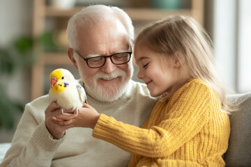 A joyful moment between grandfather and his granddaughter, sharing tender interaction with pet bird. Their smiles reflect warmth and happiness in cozy setting