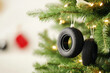 © Vilma - Christmas tree decorated with car tires, original  car shop christmas time decor