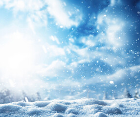 snow falling on snowy ground with sun shining through clouds in winter wonderland