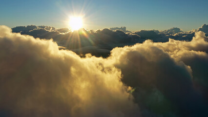 Wall Mural - aerial view of clouds and morning sun