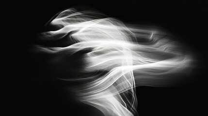 Wall Mural - long exposure image of abstract white light trails forming an ethereal and mysterious shape against 