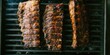 © DVS - Grilled Ribs with Char Marks on Open Flame Grill