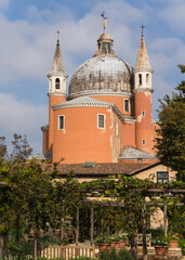 Wall Mural - Detail of a garden and detail of the church of Redentore in Venice, Italy