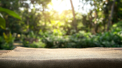 Aufkleber - table wood for coffee product, Empty wooden table and sack tablecloth over blur park, garden outdoor with bokeh light background