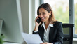 © mattegg - Businesswoman on Phone in Office