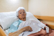 © ADDICTIVE STOCK - Elderly Woman Resting Comfortably in Residential Care