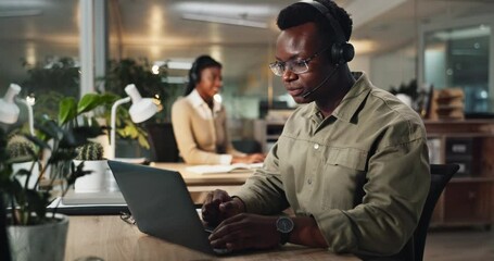 Poster - African man, call center and laptop at office with typing, reading and telemarketing at night. Person, consultant and headset with mic, pc and customer service with voip for tech support at startup