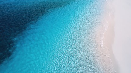 Serene Aerial View of Turquoise Ocean and Sandy Beach