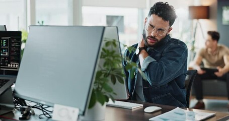 Tired, man and computer screen with neck pain in office for medical risk, website update and burnout stress. Worker, glasses and shoulder strain with IT pressure, software development and deadline