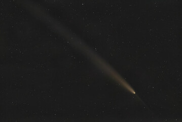 Wall Mural - real photo of comet c/2023 a3 (tsuchinshan-atlas). dark background. soft focus.