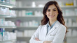 © SachinGusain - Portrait of a professional female pharmacist crossed arms in a medical store or drugstore.