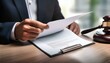 © SSuperTier - A panoramic banner featuring a lawyer or legal advisor meticulously reading and reviewing a contract document