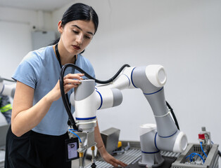 Wall Mural - hispanic engineer woman working on ai technology in robotics electronics engineering laboratory. uni