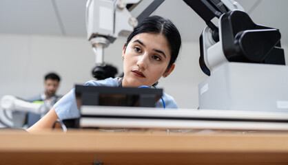 Wall Mural - hispanic engineer woman working on ai technology in robotics electronics engineering laboratory. uni