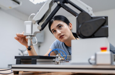Wall Mural - hispanic engineer woman working on ai technology in robotics electronics engineering laboratory. uni