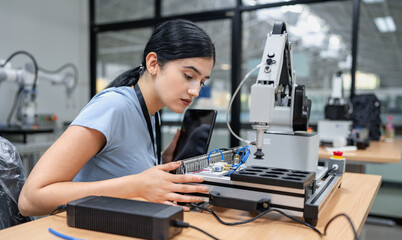 Wall Mural - hispanic engineer woman working on ai technology in robotics electronics engineering laboratory. uni