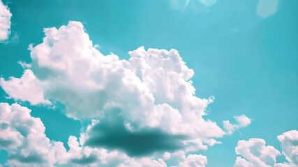 Wall Mural - soft, fluffy white clouds floating in a bright blue sky, creating a peaceful and serene atmosphere w
