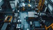 © WITTAYA  ANGMUJCHA - Bird's-eye view of a spacious plastic manufacturing facility, showing large molding machines surrounded by containers of plastic pellets and finished products