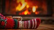 © zhou yan - Cozy close-up of a person in wool socks relaxing by a warm fireplace with a wooden floor and a festive Christmas sweater. A coffee mug in hand completes the inviting scene, set against a forested back