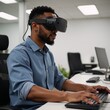 © Pixel Matrix - A male African American software developer tests VR user experience in an offices copy room while wearing a VR headset