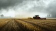 A red tractor plows through a field under a cloudy sky, creating dust and preparing the land.