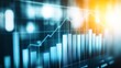 © hamzahalderad - A digital screen displaying a blue and orange graph with bars and a line showing upward growth.