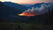 © realone952 - There is a fire in a clearing near the mountains late in the evening
