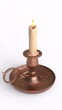 © Masihullah - copper candlestick with white background