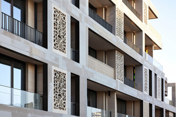 Wall Mural - facade of a residential building with white facade  and Islamic architectural elements