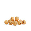 © Mahananda - Floating Wooden Spheres with Smiling Faces on a Transparent Background