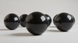 © CYBERPINK - A group of black spheres are arranged in a row