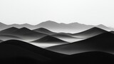   A crisp B&W image captures a soaring bird above an expansive mountain range in the background