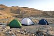 © Georgy Dzyura - Three camping tents in a desert Negev in evening. Hiking in the desert in Israel.