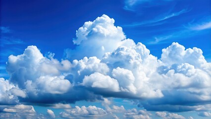 fluffy white clouds contrast against a clear blue sky , sky, fluffy, clouds, blue, serene, peaceful,