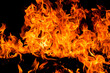 © Korneliia - Fire flames on black background. Fire burn flame isolated. Fire flames texture. Flaming burning effect. Fire wallpaper. Abstract art pattern with copy space.