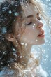© kardaska - Beautiful woman enjoying falling snowflakes in winter wonderland